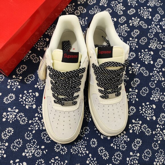 Supreme x Nike Air Force 1 White & Black Sneakers
